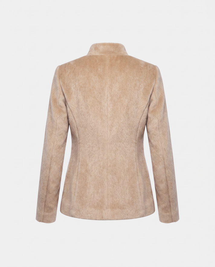A beige textured faux fur or suede blazer shown from the back, featuring a high collar and long sleeves, set against a plain light gray background.